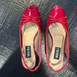 Patten leather peep toed low heeled sling backs